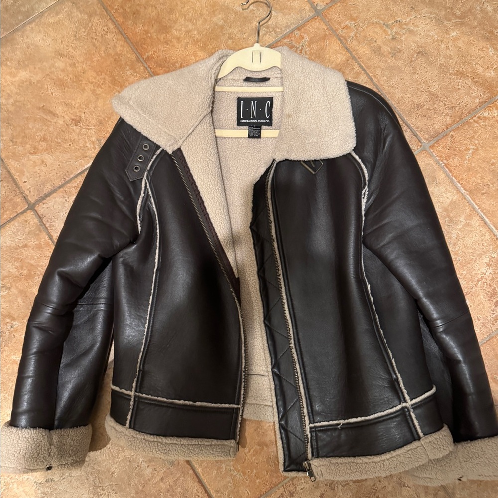 Great looking motorcycle jacket with shearling trim.